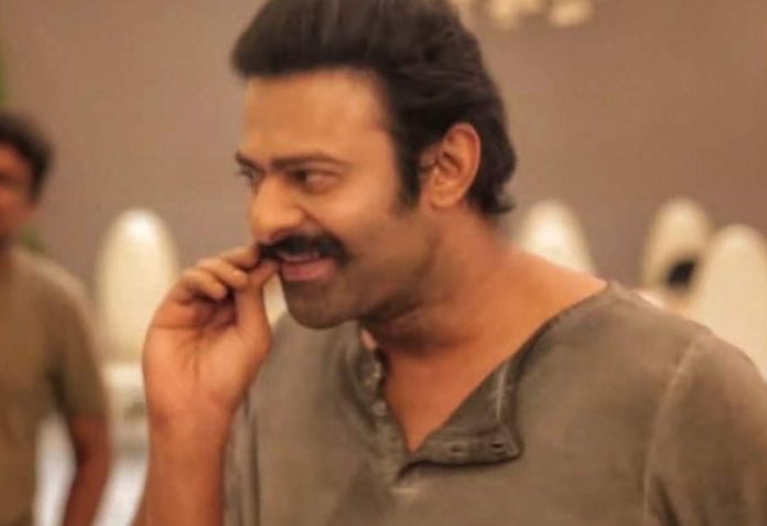 Prabhas Looks Super Stylish In A Thick Mustache & Curvy Body